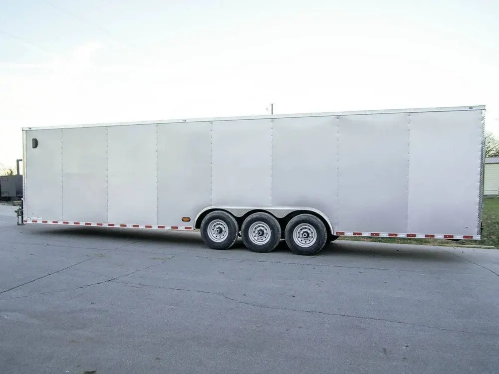 8.5 x 32 Silver Flat Nose Enclosed Car Hauler Trailer with (3) 7K Axles 21K GVWR — view 4