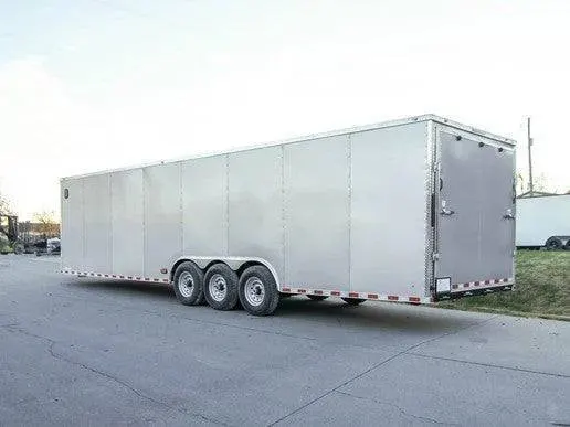 8.5 x 32 Silver Flat Nose Enclosed Car Hauler Trailer with (3) 7K Axles 21K GVWR — view 5