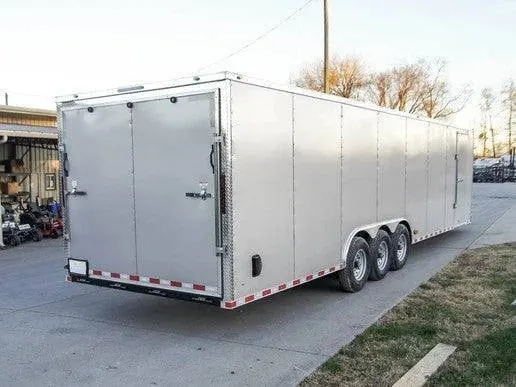 8.5 x 32 Silver Flat Nose Enclosed Car Hauler Trailer with (3) 7K Axles 21K GVWR — view 8